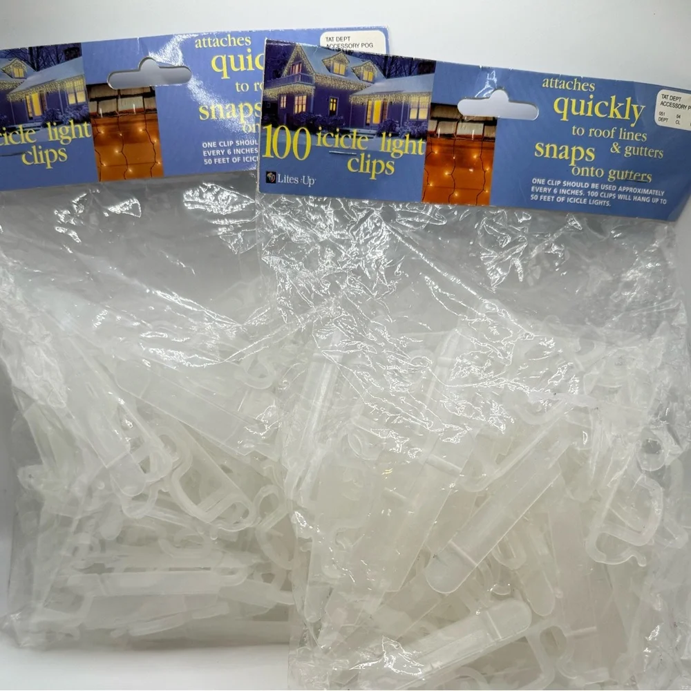2 Lite Up &1 Santa’s Best 100 icicle light clips 300 total.Christmas light clips